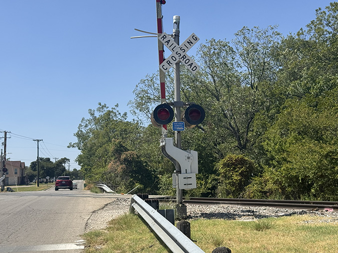 ENS sign on a crossing signal in Stephenville, Texas.